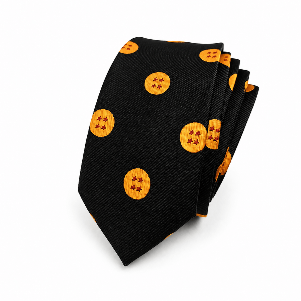 Corbata Goku Negra artesanal para hombre fabricada a mano en España con algodón de alta calidad. Diseño exclusivo sobre fondo negro decorado con esferas naranjas inspiradas en las legendarias bolas de dragón con estrellas rojas en su interior. Corbata elegante con medidas de 150 cm de largo y 6 cm de ancho, perfecta para bodas, novios, invitados, comuniones, bautizos, graduaciones, eventos especiales y celebraciones. Complemento original confeccionado artesanalmente en nuestro taller de Murcia. Ideal para combinar con trajes negros, azul marino, gris marengo o verde botella junto a camisas blancas, azules o grises. Regalo perfecto para amantes del anime, la artesanía española y la moda masculina elegante. ALT SEO (English) (+100 words) Handmade Black Goku Tie for men, carefully crafted in Spain using premium quality cotton in our artisan workshop. This elegant black necktie features an exclusive pattern of bright orange dragon-inspired spheres with red stars, creating a sophisticated design inspired by a legendary anime universe. Measuring 150 cm long and 6 cm wide, this tie is perfect for weddings, grooms, groomsmen, guests, baptisms, communions, business meetings, formal events and special celebrations. It pairs beautifully with black, navy blue, charcoal grey and dark green suits together with white or light blue shirts. A unique handcrafted accessory and an excellent gift for anime lovers and stylish gentlemen looking for something exclusive. ALT SEO (Français) (+100 mots) Cravate Goku Noire artisanale pour homme fabriquée à la main en Espagne dans notre atelier avec du coton de haute qualité. Cette élégante cravate noire présente un motif exclusif composé de sphères orange avec des étoiles rouges inspirées d'un univers d'animation légendaire. Avec une longueur de 150 cm et une largeur de 6 cm, elle est idéale pour les mariages, les mariés, les invités, les baptêmes, les communions, les cérémonies, les événements professionnels et les occasions spéciales. Elle s'accorde parfaitement avec des costumes noirs, bleu marine, gris anthracite ou vert foncé ainsi qu'avec des chemises blanches, bleu clair ou gris clair. Une idée cadeau originale pour les amateurs d'artisanat espagnol, d'élégance masculine et de culture japonaise. ALT SEO (Italiano) (+100 parole) **Cravatta Goku Nera artigianale da uomo realizzata a mano in Spagna nel nostro laboratorio utilizzando cotone di alta qualità. Il design presenta un elegante fondo nero decorato con sfere arancioni ispirate alle leggendarie sfere del drago con stelle rosse al centro, creando uno stile originale ma raffinato. Con una lunghezza di 150 cm e una larghezza di 6 cm, questa cravatta è perfetta per matrimoni, sposi, invitati, comunioni, battesimi, cerimonie, eventi eleganti e occasioni speciali. Si abbina perfettamente ad abiti neri, blu navy, grigio antracite o verde bottiglia con camicie bianche, azzurre o grigio chiaro. Un regalo esclusivo per gli appassionati di anime, artigianato spagnolo e moda maschile di alta qualità.